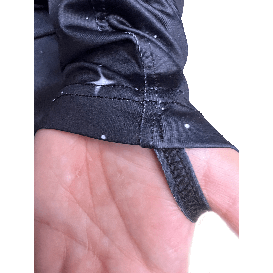 Close-up of Moon Dust hoodie zipper and thumbhole sleeves for added comfort and practicality