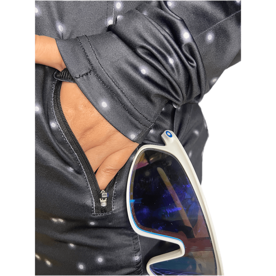 Detail view of zippered side pockets and ergonomic design for comfort and functionality.