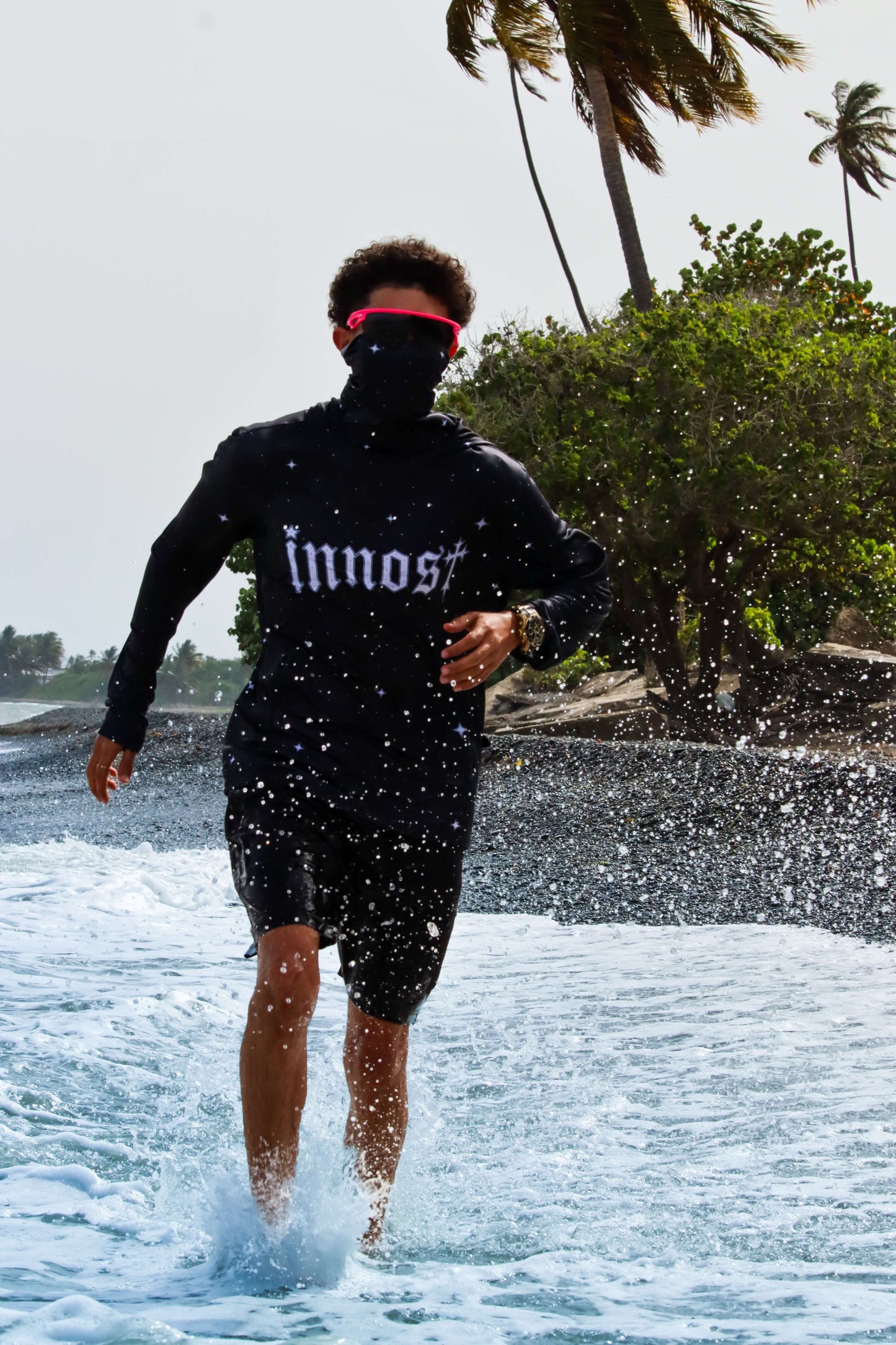 Model showcasing Moon Dust hoodie on the beach – ideal for outdoor activities, sun protection UPF 50+.