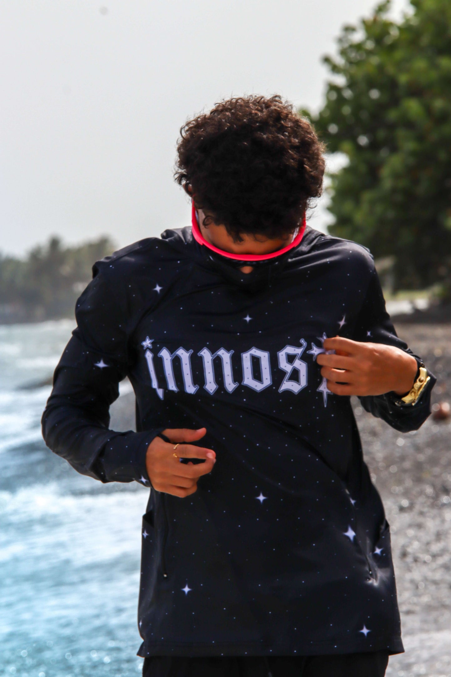 Model showcasing Moon Dust hoodie on the beach – ideal for outdoor activities, sun protection UPF 50+.