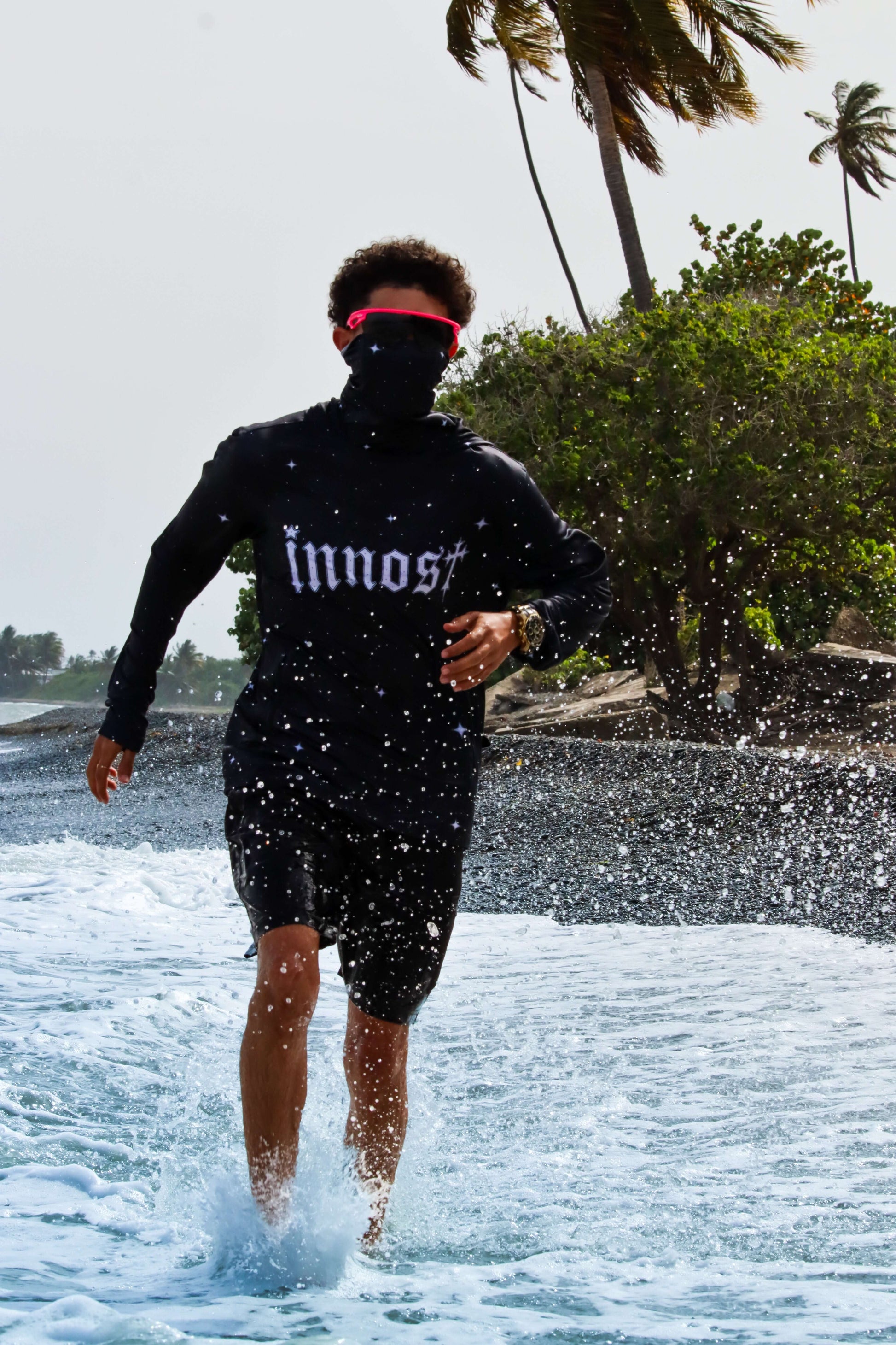 Model showcasing Moon Dust hoodie on the beach – ideal for outdoor activities, sun protection UPF 50+.